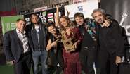 Rock gegen Hunger 2019: Gruppenfoto mit dem Logo des Marketing Clubs Köln-Bonn im Hintergrund. Rock gegen Hunger 2019: Gruppenfoto mit dem Logo des Marketing Clubs Köln-Bonn im Hintergrund.