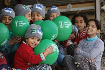 Syrische Kinder in der Türkei Syrische Kinder mit Welthungerhilfe-Luftballons
